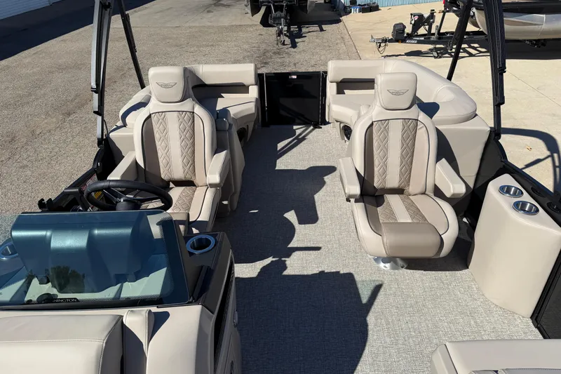 Slide: The Image of 2026 Bennington 24 M Fastback interior with luxurious seating and modern design. - 13