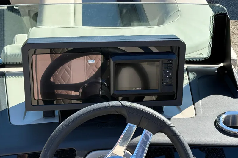 Slide: The Image of Steering console of 2026 Bennington 24 M Fastback with Garmin display. - 17