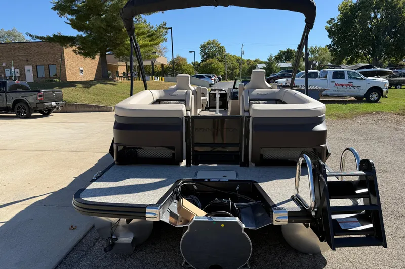 Slide: The Image of 2026 Bennington 24 M Fastback pontoon boat with rear deck and seating area. - 6