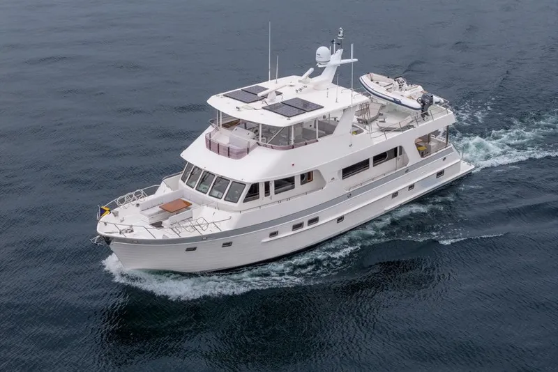 Slide: The Image of 2022 Outer Reef Yachts 720 Motor Yacht cruising on open water. - 8