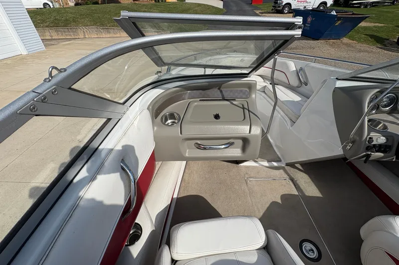 Slide: The Image of 2007 Crownline 190 SS boat interior with open windshield and seating area. - 16