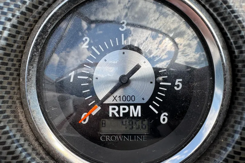 Slide: The Image of Close-up of a 2007 Crownline 190 SS RPM gauge, showing 936 hours. - 24