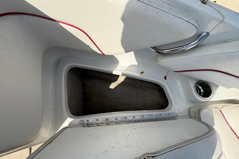 Slide: The Image of Open storage compartment in a 2007 Crownline 190 SS boat interior. - 9