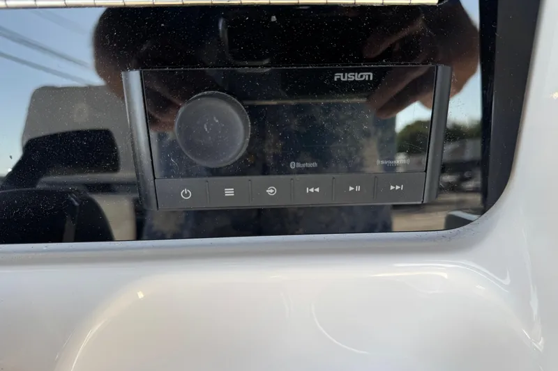 Slide: The Image of Fusion audio system on a 2026 Blackfin 242HB boat dashboard. - 11