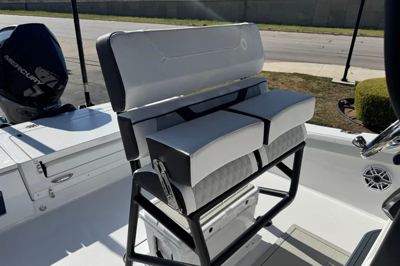 Slide: The Image of 2026 Blackfin 242HB boat seating with Mercury engine, showcasing modern design and comfort. - 12