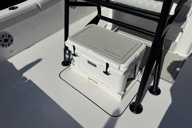 Slide: The Image of 2026 Blackfin 242HB boat deck with Yeti cooler and seating. - 14