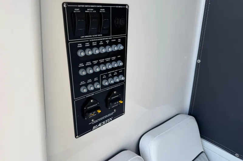 Slide: The Image of Control panel on 2026 Blackfin 242HB boat, featuring switches and indicators. - 20