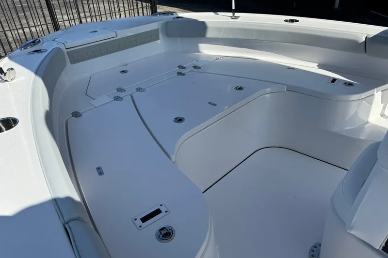 Slide: The Image of 2026 Blackfin 242HB boat interior with spacious seating and storage compartments. - 29