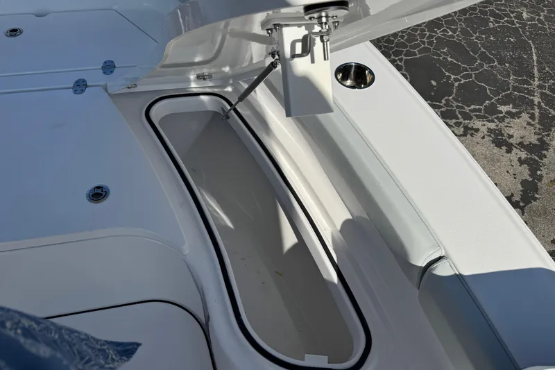 Slide: The Image of Open storage compartment on 2026 Blackfin 242HB boat, showcasing sleek design and functionality. - 33