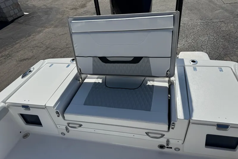 Slide: The Image of 2026 Blackfin 242HB boat with foldable seating and storage compartments. - 39