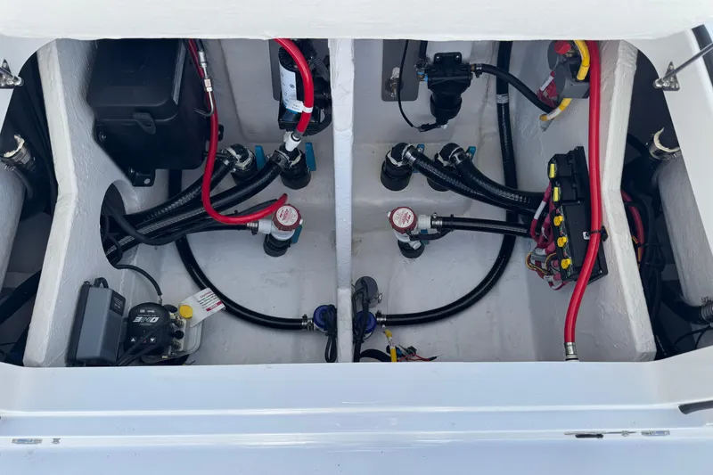 Slide: The Image of Engine compartment of 2026 Blackfin 242HB boat, showcasing wiring and components. - 41