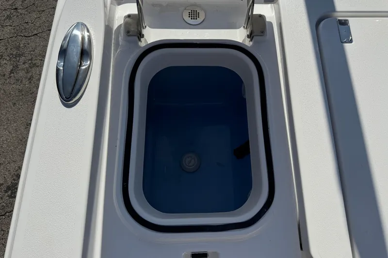Slide: The Image of Livewell compartment on 2026 Blackfin 242HB boat, featuring sleek design and functionality. - 46