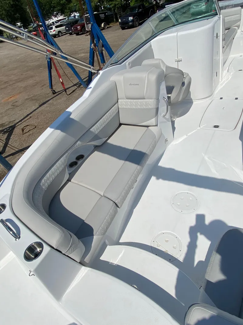 Slide: The Image of 2023 Hurricane SD 2690 OB boat interior with sleek seating and modern design. - 14