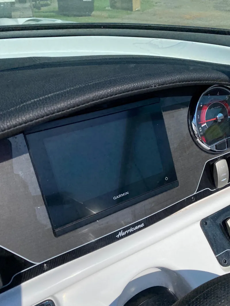 Slide: The Image of Dashboard of 2023 Hurricane SD 2690 OB boat with Garmin display. - 26