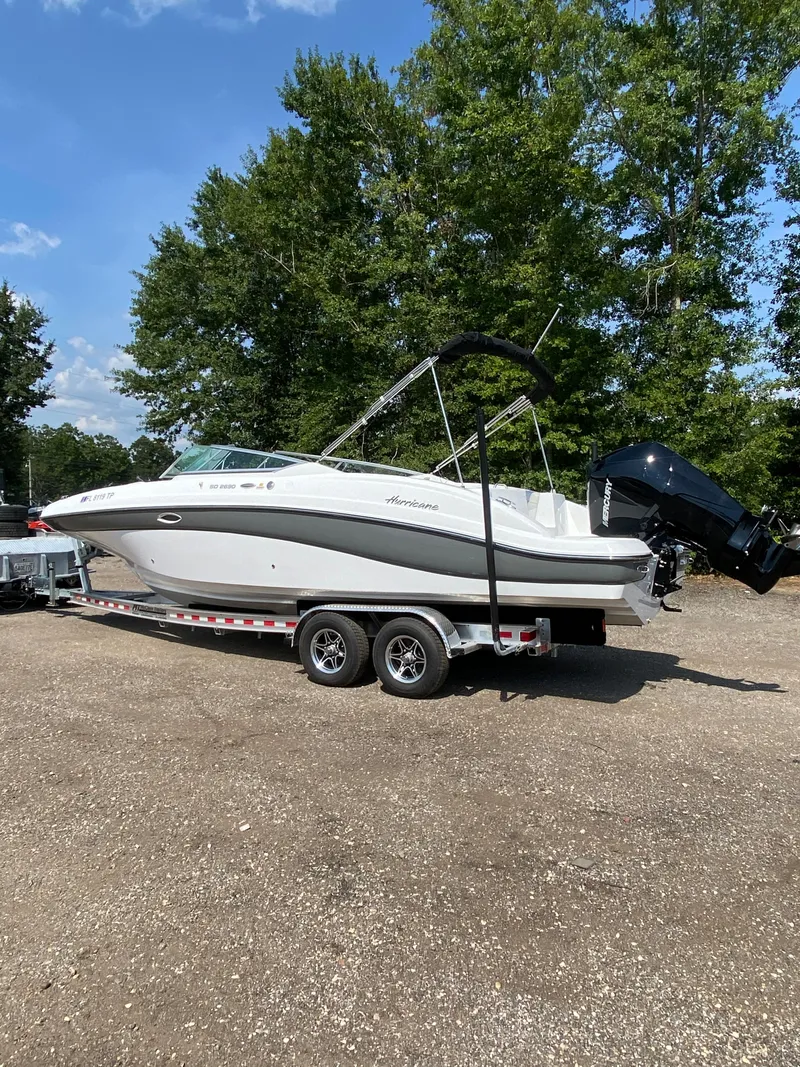 Slide: The Image of 2023 Hurricane SD 2690 OB boat on trailer, parked outdoors. - 3