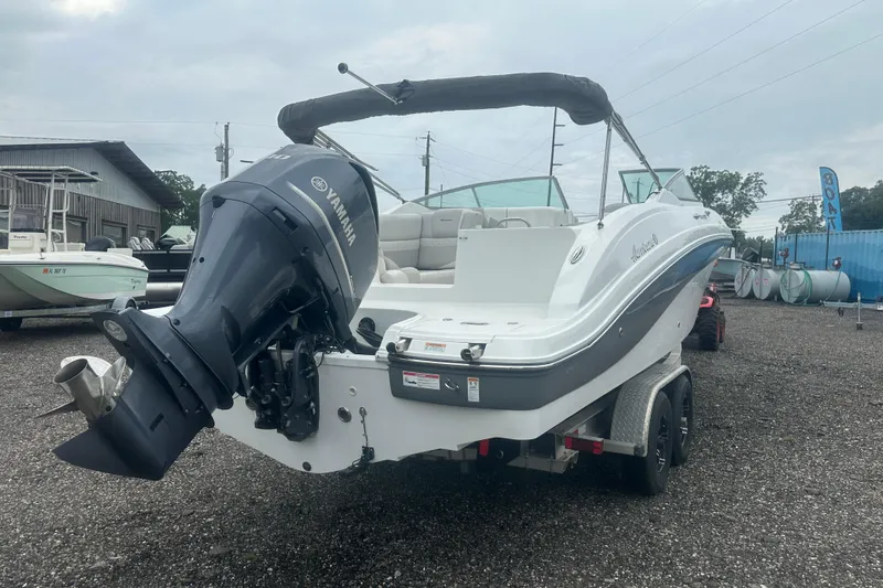 Slide: The Image of 2023 Hurricane SD 2690 OB boat with Yamaha outboard motor on a trailer. - 31