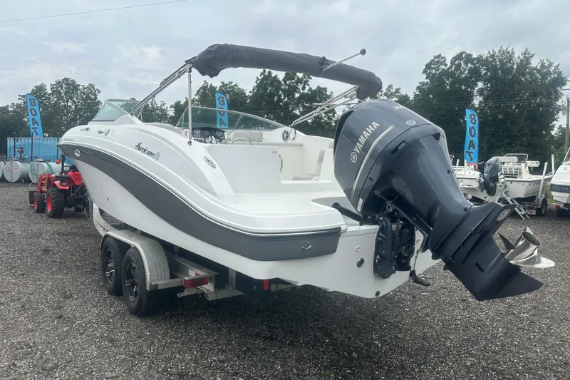 Slide: The Image of 2023 Hurricane SD 2690 OB boat with Yamaha outboard motor on trailer. - 32