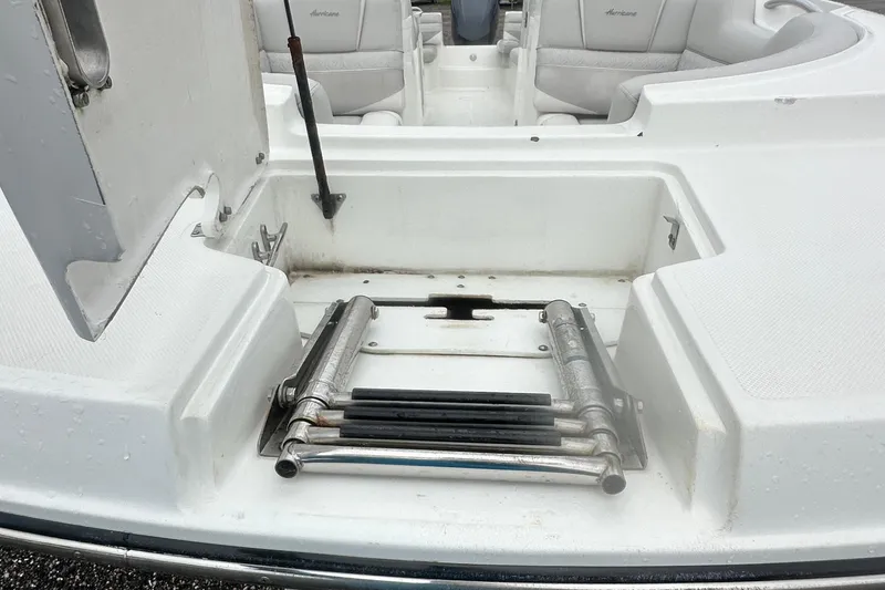 Slide: The Image of 2023 Hurricane SD 2690 OB boat with foldable ladder and seating area. - 38
