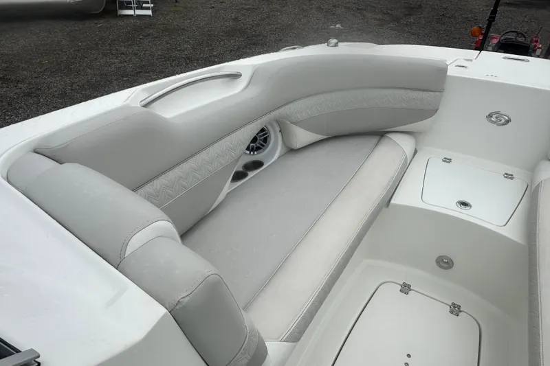 Slide: The Image of 2023 Hurricane SD 2690 OB boat interior with cushioned seating and storage compartments. - 39
