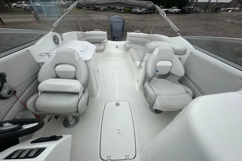 Slide: The Image of 2023 Hurricane SD 2690 OB boat interior with white seating and modern design. - 44