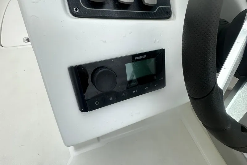 Slide: The Image of Control panel of 2023 Hurricane SD 2690 OB boat with Fusion audio system. - 50