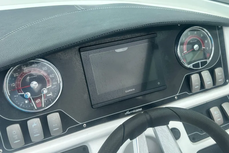 Slide: The Image of Dashboard of 2023 Hurricane SD 2690 OB boat with Garmin display and gauges. - 51