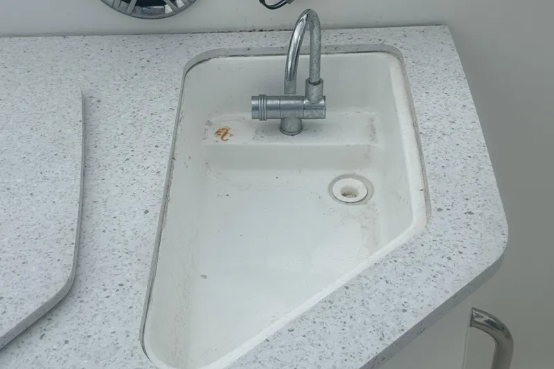 Slide: The Image of Compact sink with faucet on 2023 Hurricane SD 2690 OB boat. - 55
