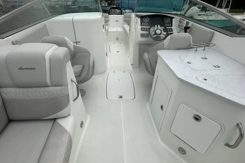 Slide: The Image of Interior of 2023 Hurricane SD 2690 OB boat with seating and control panel. - 60