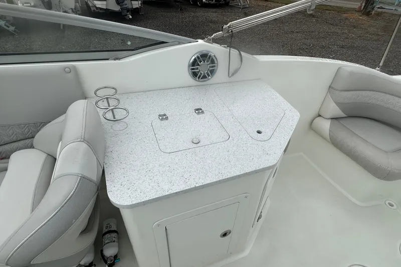 Slide: The Image of 2023 Hurricane SD 2690 OB boat interior with seating and countertop. - 62