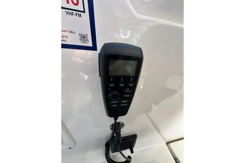 Slide: The Image of Yamaha engine display on 2020 Pursuit OS 355 Offshore boat showing trip and total hours. - 12