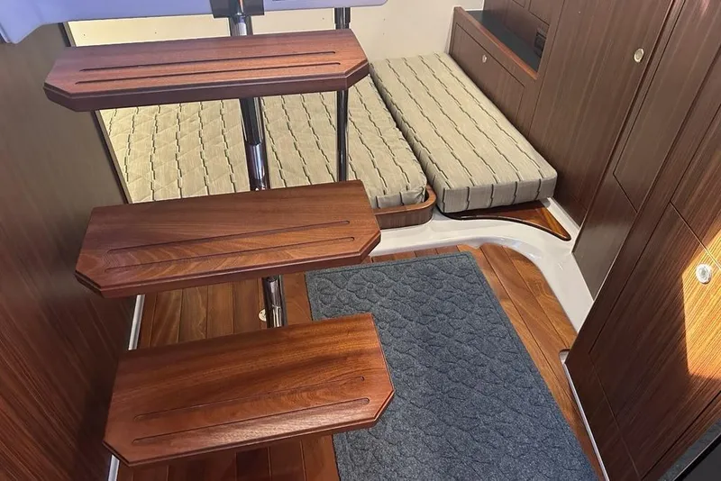 Slide: The Image of Modern kitchen in 2020 Pursuit OS 355 Offshore boat with sink, stove, and microwave. - 24