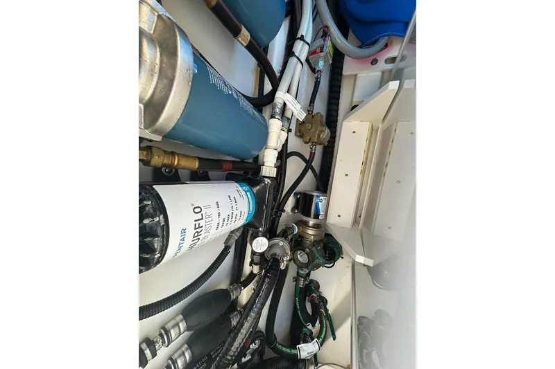 Slide: The Image of 2020 Pursuit OS 355 Offshore hydraulic steering system with cables and pumps. - 48