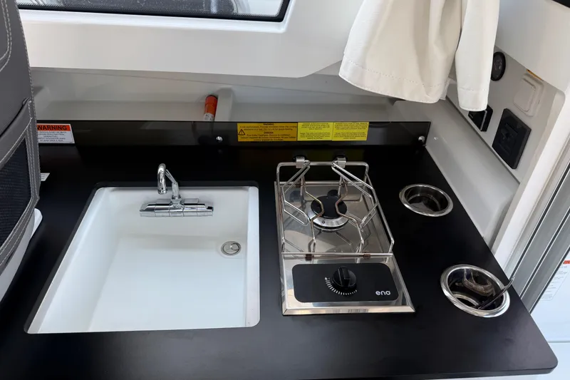 Slide: The Image of 2024 Jeanneau NC Weekender 795 Series 2 with Garmin radar on deck. - 28