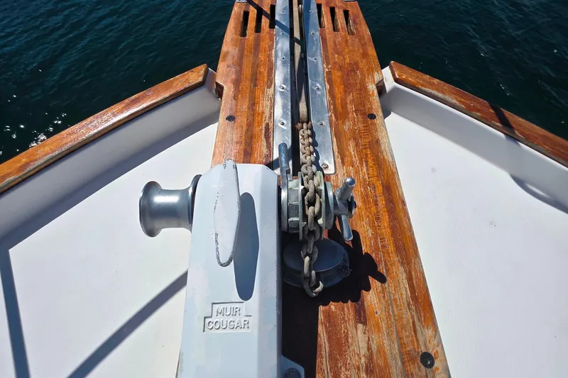 Slide: The Image of Bow of 1985 Bayliner 4550 Motoryacht with anchor chain and winch. - 53