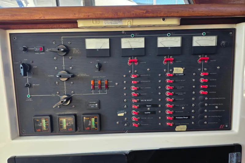 Slide: The Image of Control panel of a 1985 Bayliner 4550 Motoryacht with switches and gauges. - 55