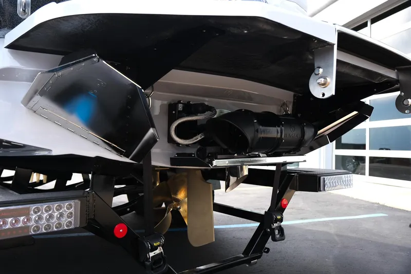 Slide: The Image of 2026 MasterCraft XT24 boat underside showing propeller and mechanical components. - 10