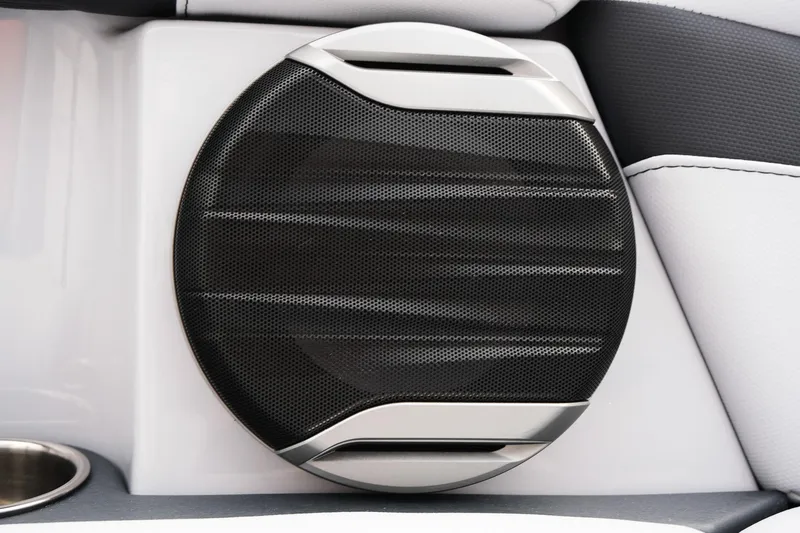 Slide: The Image of 2026 MasterCraft XT24 boat speaker with sleek black and silver design. - 21