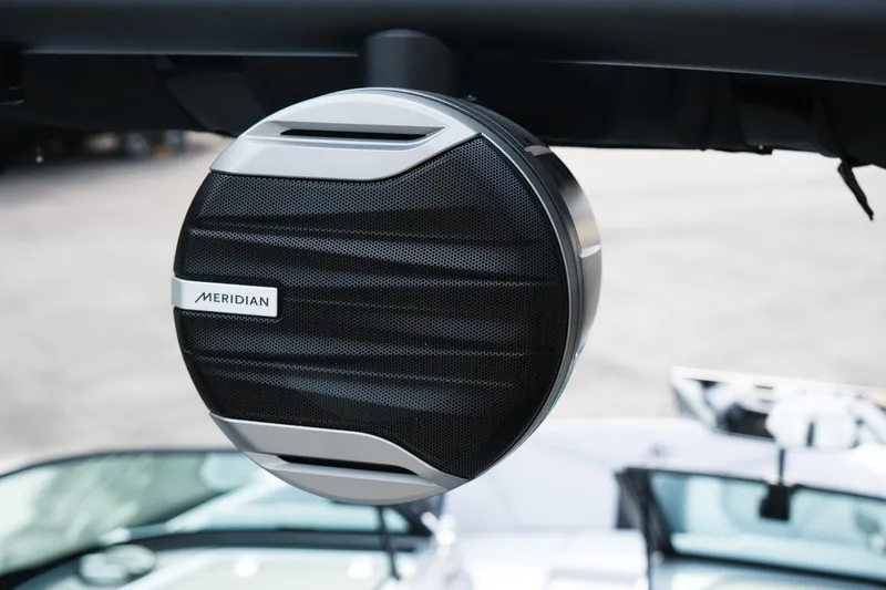 Slide: The Image of Meridian speaker on 2026 MasterCraft XT24 boat, showcasing premium audio design. - 26
