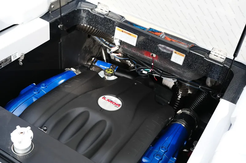 Slide: The Image of Engine compartment of 2026 MasterCraft XT24 boat featuring Ilmor engine components. - 35