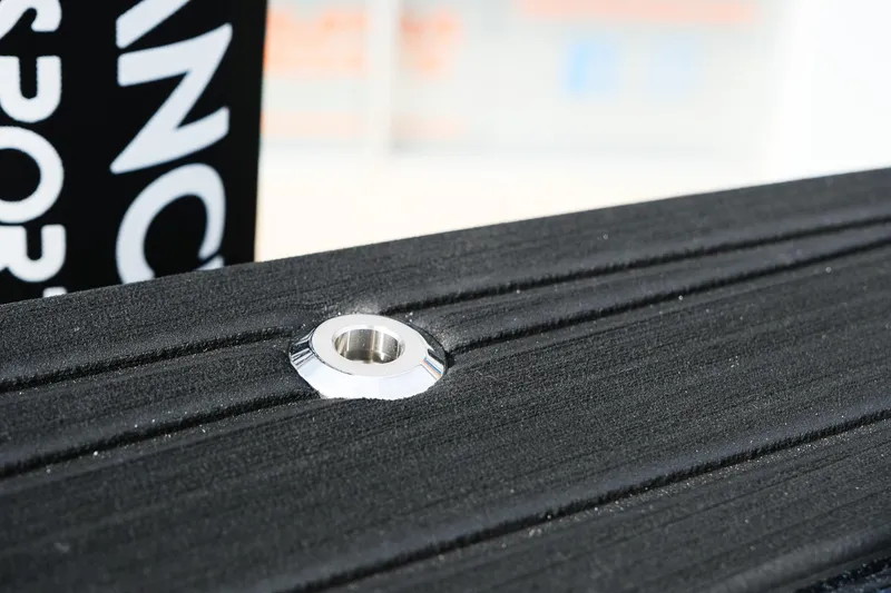 Slide: The Image of Close-up of 2026 MasterCraft XT24 boat deck with metal fitting detail. - 37