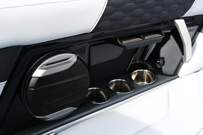 Slide: The Image of 2026 MasterCraft XT24 interior with speaker, cup holders, and sleek design elements. - 45