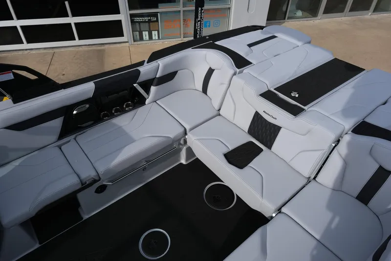 Slide: The Image of Luxurious interior of 2026 MasterCraft XT24 boat with sleek white seating and modern design. - 48
