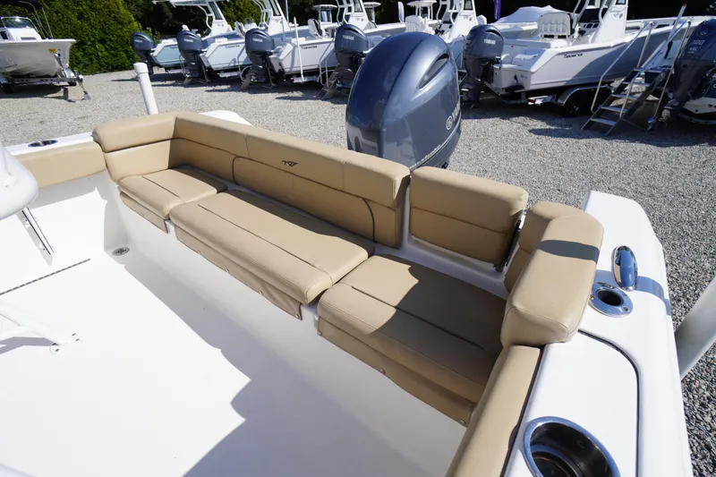Slide: The Image of 2016 Tidewater 220 LXF boat with tan seating and Yamaha outboard engine. - 26