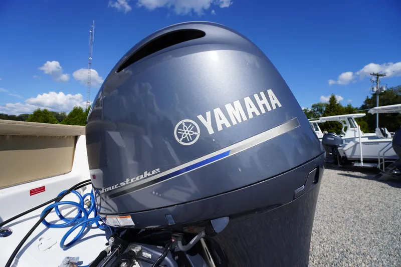 Slide: The Image of Yamaha four-stroke engine on 2016 Tidewater 220 LXF boat under clear blue sky. - 36