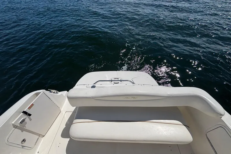 Slide: The Image of 2003 Sea Ray 280 Sundancer boat deck with ocean view. - 9