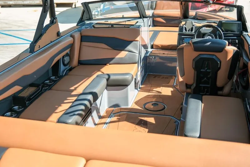 Slide: The Image of 2024 Axis T220 boat interior with luxurious seating and modern dashboard design. - 15