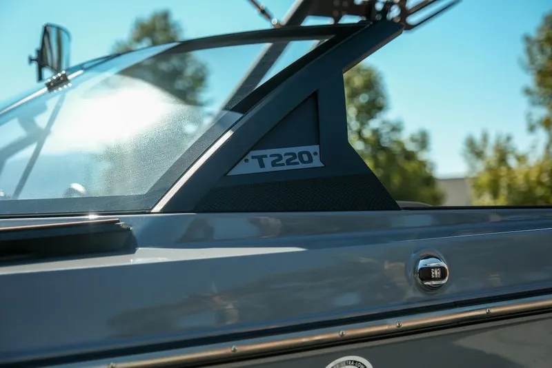Slide: The Image of 2024 Axis T220 boat detail with sleek design and modern features. - 29