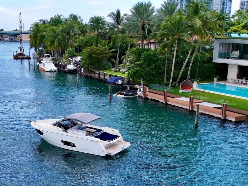 Slide: The Image of Luxury yacht Absolute 40 cruising near tropical waterfront estate, 2014 model. - 14