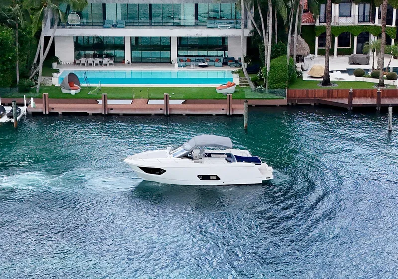 Slide: The Image of Luxurious Absolute 40 yacht cruising near waterfront mansion with pool, 2014 model. - 15