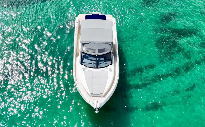 Slide: The Image of Aerial view of 2014 Absolute 40 yacht on clear turquoise water. - 33